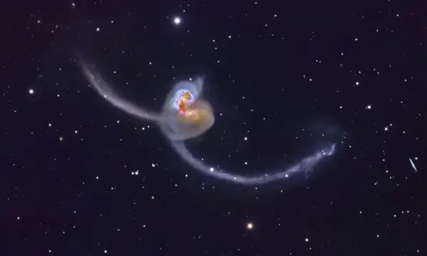 Каква глетка: Астрофотограф направи спектакуларна слика од судирот на две галаксии